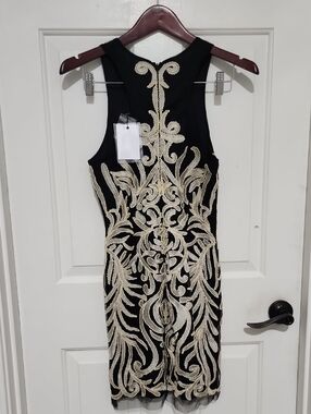 Elegant Black Dress with Gold Embroidery